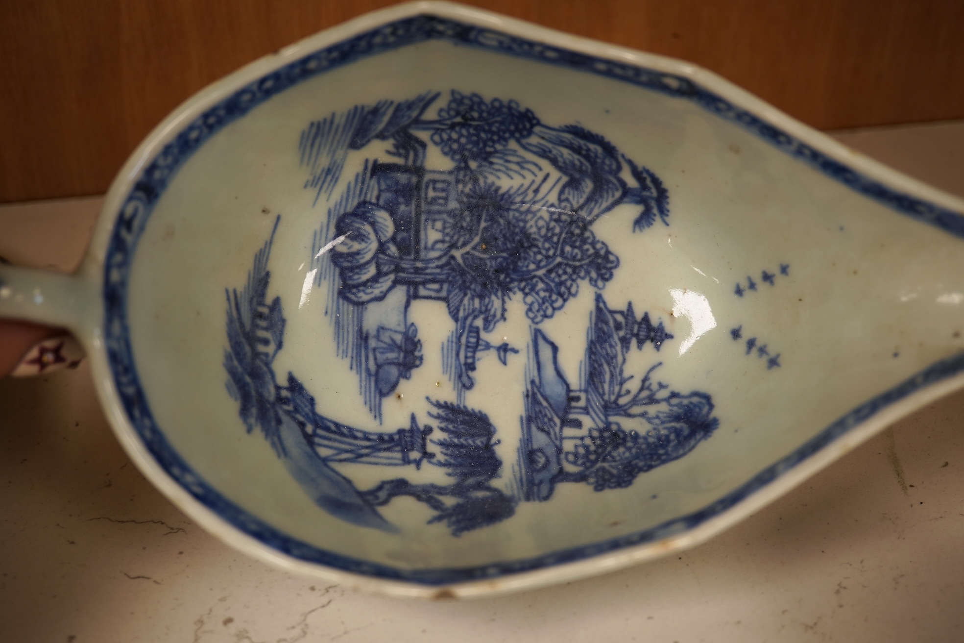 A Chinese export blue and white blue plate, sauceboat and Ko-sometsuke type dish together with a miniature tea bowl and two saucers. Plate 22cm diameter